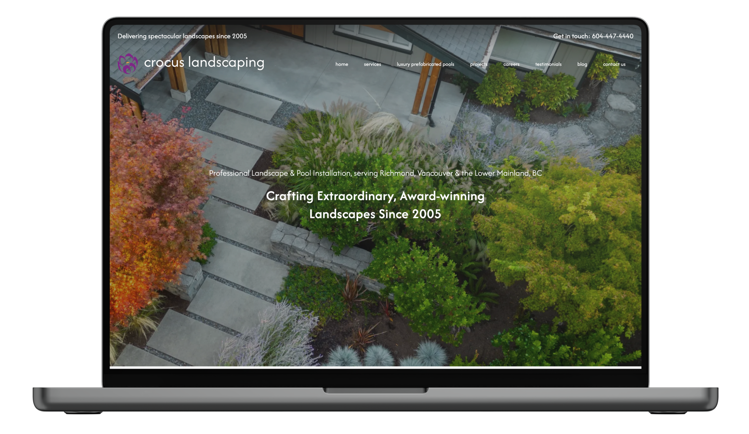 A laptop mockup featuring the header for the Crocus Landscaping home page