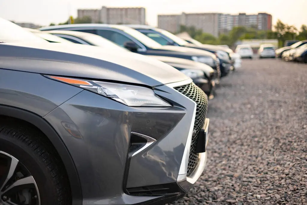 Luxury suvs parked outdoors