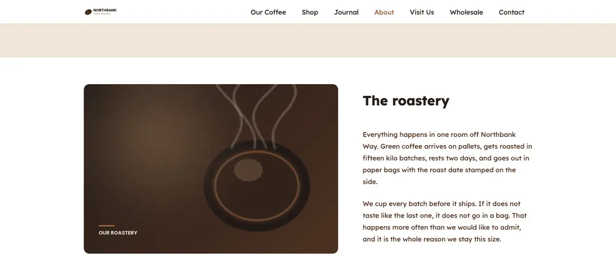 The published About page on the live website, with The roastery heading and the updated paragraph beside a photograph of a coffee roaster